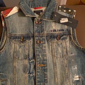 This is a blue jeans vest